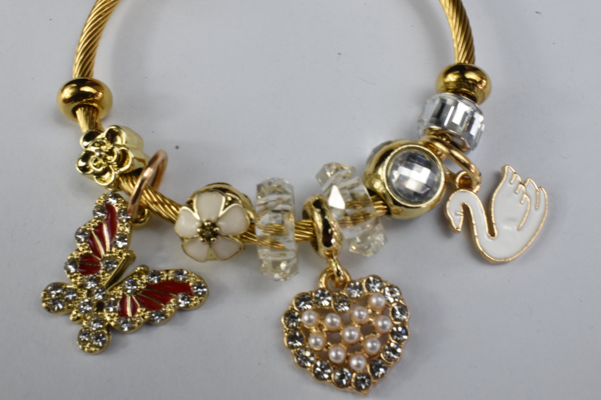 Lunara Gold Swan & Pearl Heart Charm Bracelet